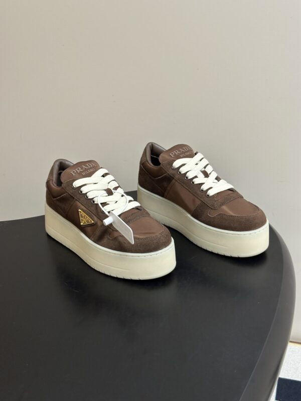 sy_no_AD8542AC201A72C5AF88292F7B6E65BE_0 Prada Brown Suede Gold Triangle Platform Sneaker