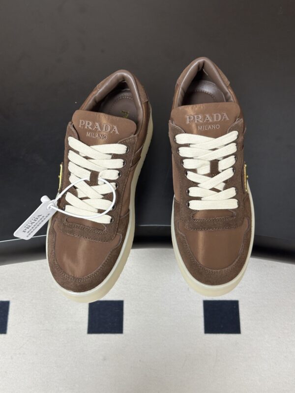 sy_no_AD8542AC201A72C5AF88292F7B6E65BE_1 Prada Brown Suede Gold Triangle Platform Sneaker