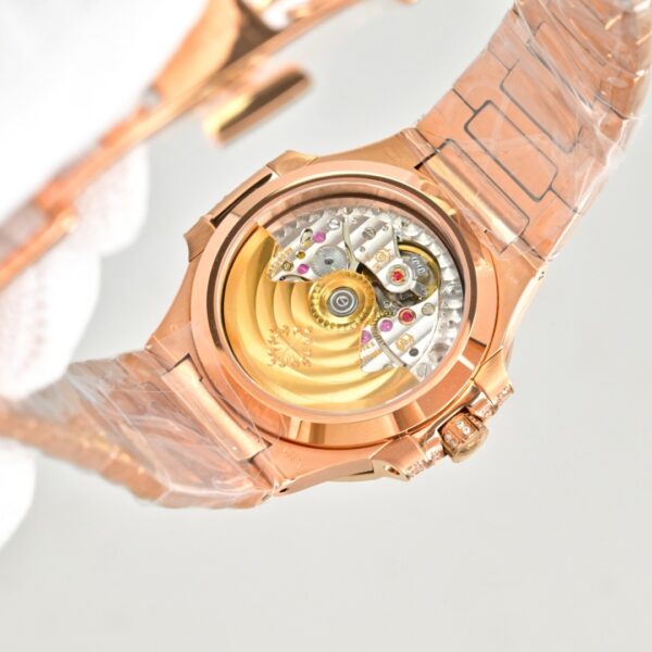 sy_no_AE6EB00A1031D204483AE1FCEE18FC5C_8 Patek Philippe Sporty Elegance NAUTILUS Series Nautilus Automatic Mechanical Movement Swiss Watch Gold Dial Gold Strap
