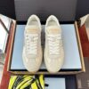 sy_no_B070B9A49641834C79A6C9DE2055A510_0 Prada Off-White Suede Gold Triangle Platform Sneaker