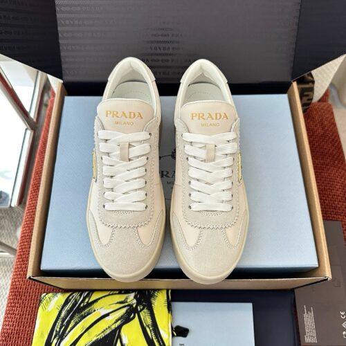 sy_no_B070B9A49641834C79A6C9DE2055A510_0 Prada Off-White Suede Gold Triangle Platform Sneaker