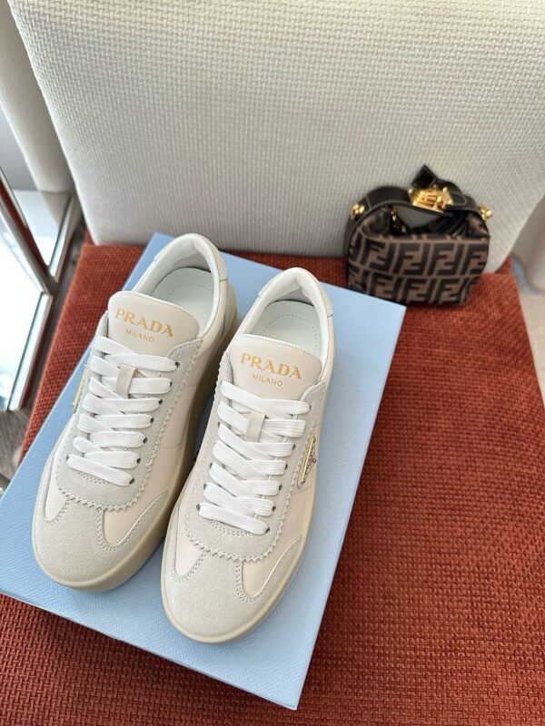 sy_no_B070B9A49641834C79A6C9DE2055A510_2 Prada Off-White Suede Gold Triangle Platform Sneaker