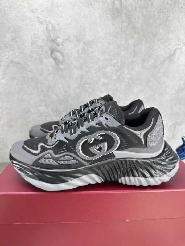 sy_no_B271AE3C58B37F7C741B43A2BF173A41_0 Gucci Interlocking G Wave Sole Sneaker in Black & Grey