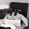 Chanel Beige and Black Mixed Material Low-Top Sneaker with Contrast Piping and CC Logo