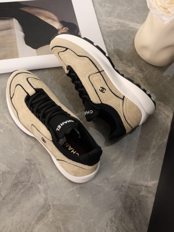 Chanel Beige and Black Mixed Material Low-Top Sneaker with Contrast Piping and CC Logo