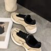 Chanel Beige and Black Mixed Material Low-Top Sneaker with Contrast Piping and CC Logo