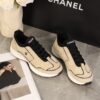 Chanel Beige and Black Mixed Material Low-Top Sneaker with Contrast Piping and CC Logo