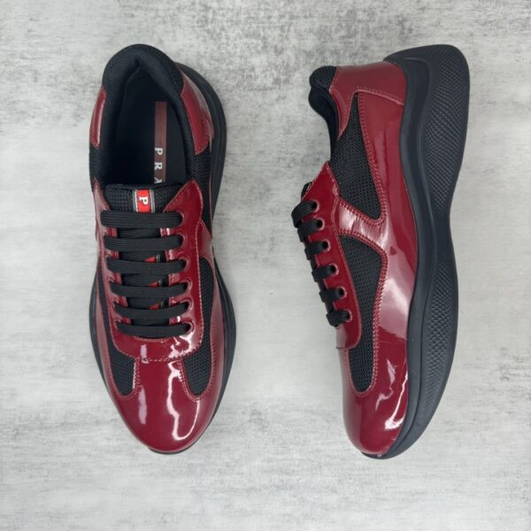 sy_no_B60F09D997ABE57CCDD049B29443F4A2_2 Prada America's Cup Burgundy Patent Mesh Sneaker