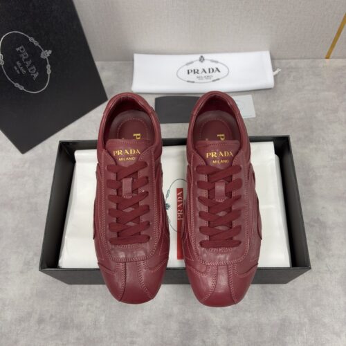 sy_no_B7B9F0D7CA16817245D4B4CCDB59A001_0 Prada Burgundy Leather Gold Logo Trainer