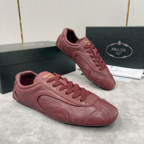 sy_no_B7B9F0D7CA16817245D4B4CCDB59A001_2 Prada Burgundy Leather Gold Logo Trainer