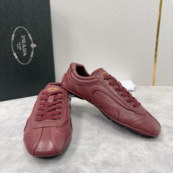sy_no_B7B9F0D7CA16817245D4B4CCDB59A001_3 Prada Burgundy Leather Gold Logo Trainer