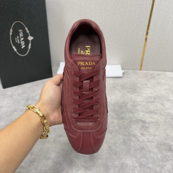 sy_no_B7B9F0D7CA16817245D4B4CCDB59A001_5 Prada Burgundy Leather Gold Logo Trainer