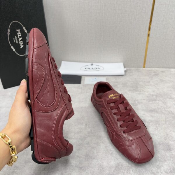 sy_no_B7B9F0D7CA16817245D4B4CCDB59A001_6 Prada Burgundy Leather Gold Logo Trainer