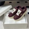 Prada Burgundy Suede Gold Triangle Platform Sneaker