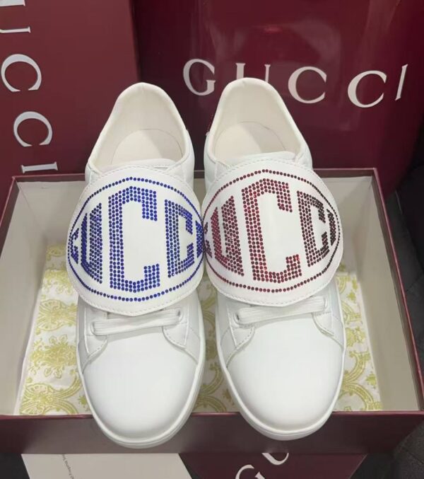 sy_no_BC8106A8DE57409D19499546F5F3EFE0_0 Gucci White Leather Low-Top Sneaker with Large Crystal Logo Flap