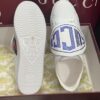 sy_no_BC8106A8DE57409D19499546F5F3EFE0_1 Gucci White Leather Low-Top Sneaker with Large Crystal Logo Flap