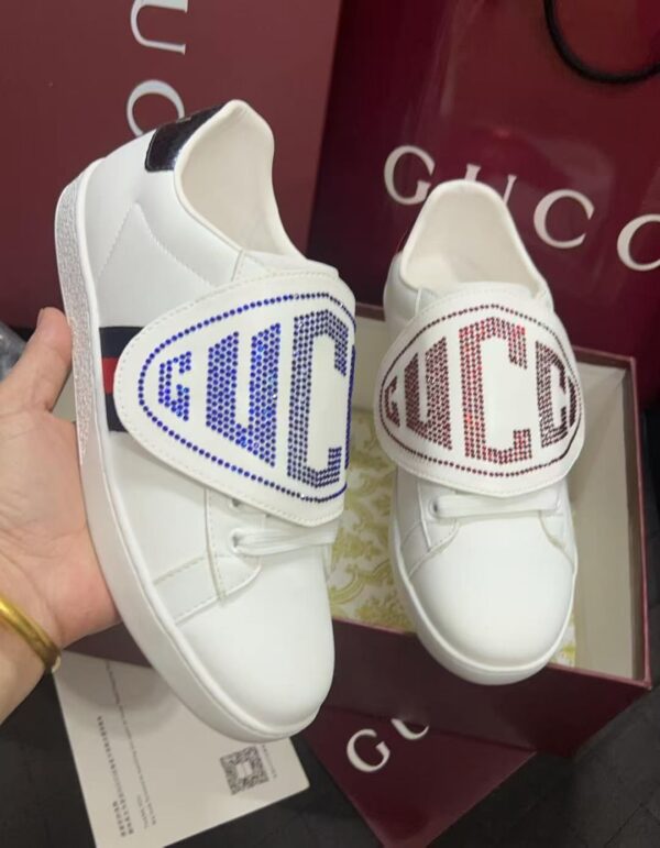 sy_no_BC8106A8DE57409D19499546F5F3EFE0_2 Gucci White Leather Low-Top Sneaker with Large Crystal Logo Flap