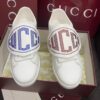 sy_no_BC8106A8DE57409D19499546F5F3EFE0_3 Gucci White Leather Low-Top Sneaker with Large Crystal Logo Flap