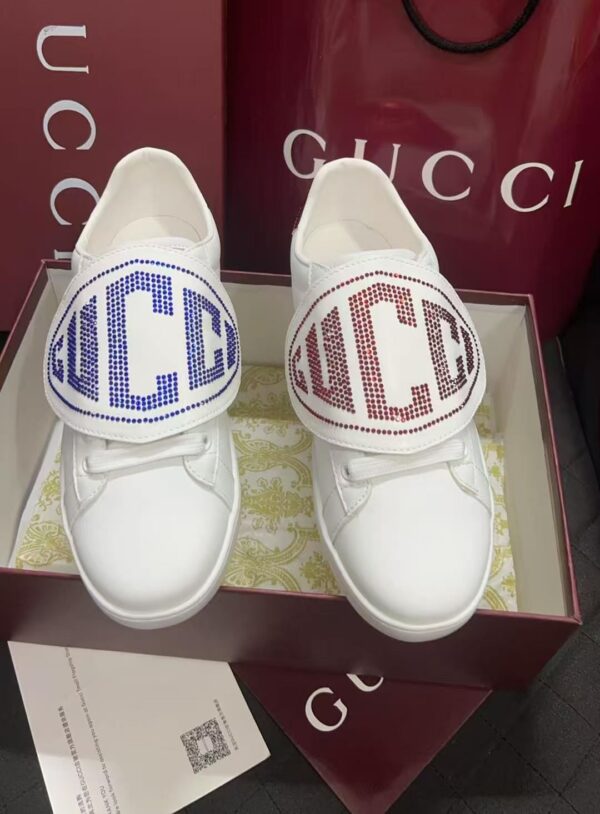 sy_no_BC8106A8DE57409D19499546F5F3EFE0_3 Gucci White Leather Low-Top Sneaker with Large Crystal Logo Flap