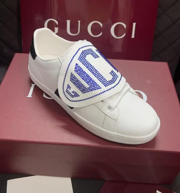 sy_no_BC8106A8DE57409D19499546F5F3EFE0_7 Gucci White Leather Low-Top Sneaker with Large Crystal Logo Flap