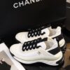 sy_no_BCB44C72A0CBB640D9AFA7D630A9F012_2 Chanel White and Black Mixed Material Low-Top Sneaker with Gold Hardware CC Logo