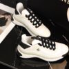 sy_no_BCB44C72A0CBB640D9AFA7D630A9F012_5 Chanel White and Black Mixed Material Low-Top Sneaker with Gold Hardware CC Logo