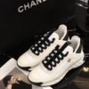 sy_no_BCB44C72A0CBB640D9AFA7D630A9F012_8 Chanel White and Black Mixed Material Low-Top Sneaker with Gold Hardware CC Logo