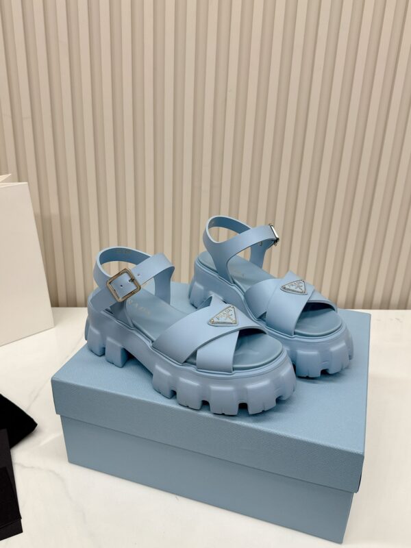 sy_no_BD510FB83BFDC48F53E036898192A523_0 Prada Dusty Blue Triangle Logo Gear Platform Sandal