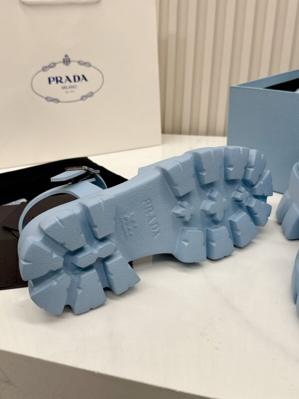 sy_no_BD510FB83BFDC48F53E036898192A523_7 Prada Dusty Blue Triangle Logo Gear Platform Sandal