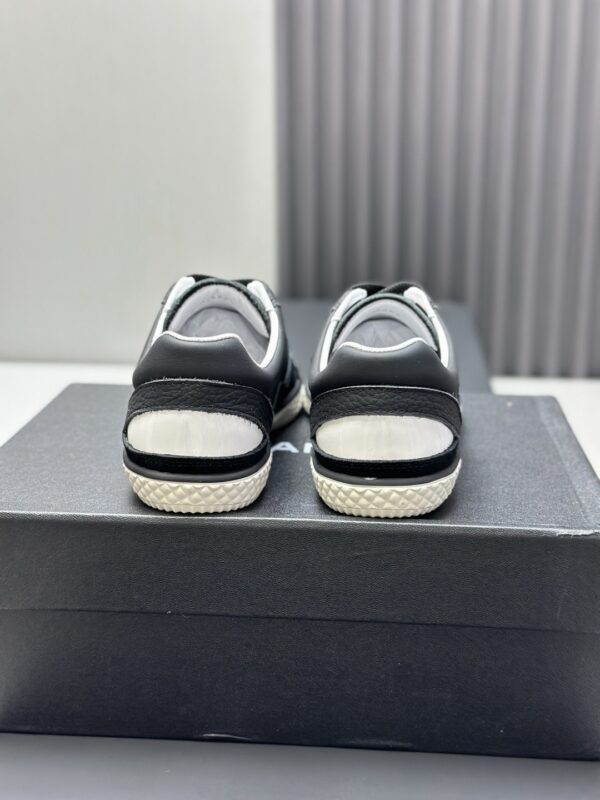 Chanel Black & White Mixed-Leather Low-Top Sneaker Black-White-Leather-Sneaker