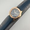 Patek Philippe rose gold Aquamarine watch, 39.9mm diameter, perpetual calendar, automatic movement, 25-year unisex model.