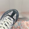Gucci Rhyton GG Canvas Sneaker in Black & Beige