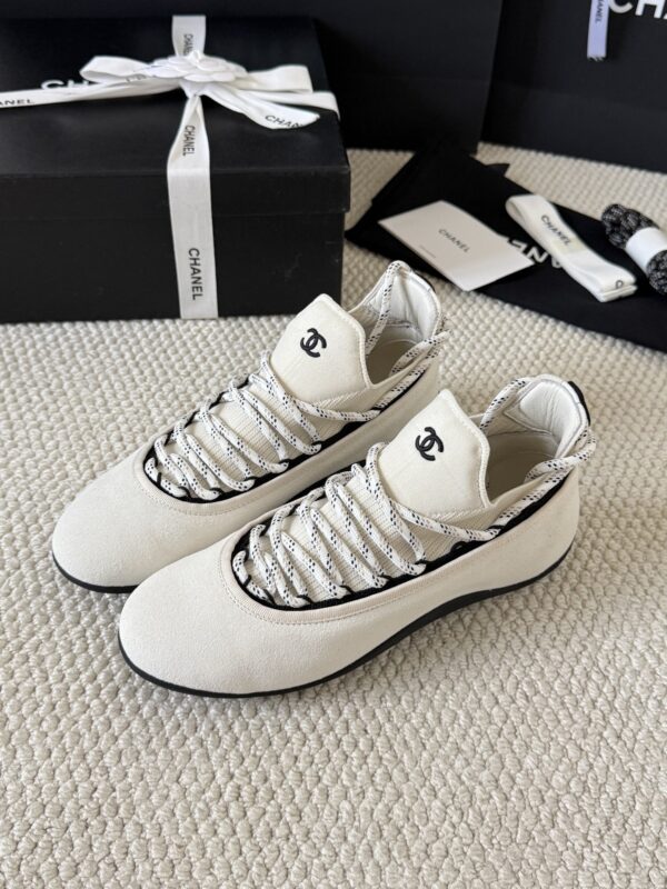 sy_no_BF7CC282A9A113B66A93CE065E6B9981_3 Chanel White Knit and Suede Slip-On Low-Top Sneaker with Speckled Laces and CC Logo
