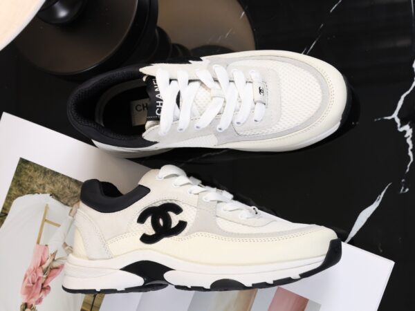sy_no_C162CBC71143F9067B183CD82A26A850_5 Chanel Off-White and Black Mixed Material Low-Top Sneaker with Suede and CC Logo