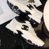 sy_no_C162CBC71143F9067B183CD82A26A850_7 Chanel Off-White and Black Mixed Material Low-Top Sneaker with Suede and CC Logo