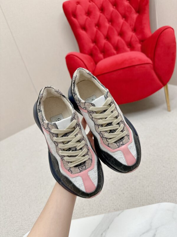 sy_no_C291AC7765B33CF35043C26F9D1EEEB9_3 Gucci Rhyton GG Canvas Sneaker in Black, Beige & Pink