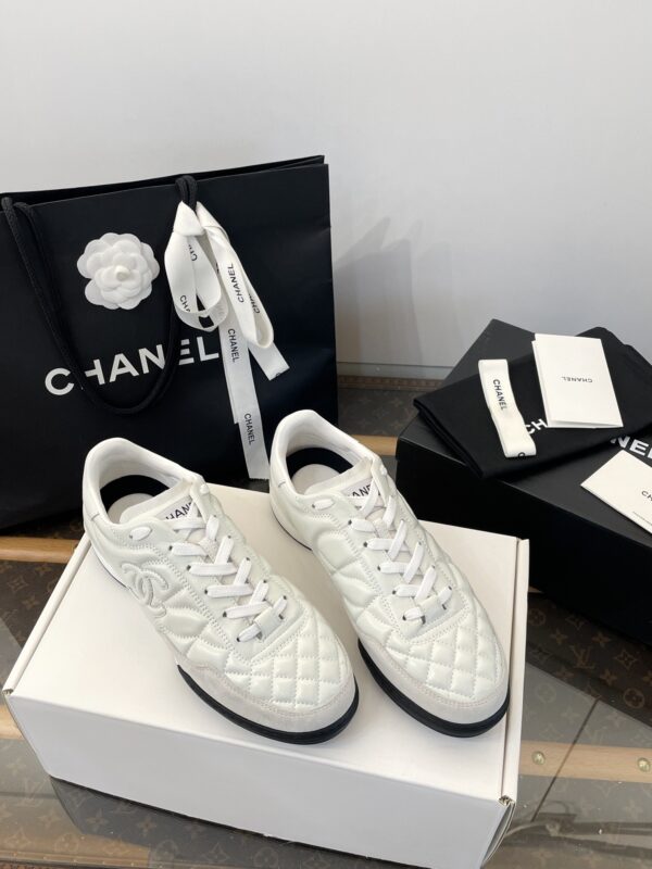 sy_no_C3497933729996B2D179E2FB460987C6_0 Chanel White Quilted Leather Low-Top Sneaker with Suede Detailing and CC Logo