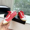 Chanel Red & White Cap-Toe Low-Top Sneaker with Red Laces