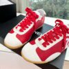 Chanel Red & White Cap-Toe Low-Top Sneaker with Red Laces