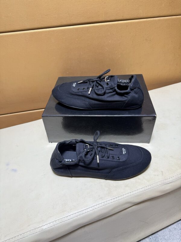 sy_no_C44A7E141A092C44C8C8B4C32CFD433D_3 Prada Black Gathered Nylon Retro Trainer
