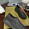 sy_no_C7382AE8A59B8FB653E6C65C272C6891_3 Prada Black Knit Red-Label Slip-On Platform Sneaker