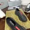 sy_no_C7382AE8A59B8FB653E6C65C272C6891_4 Prada Black Knit Red-Label Slip-On Platform Sneaker