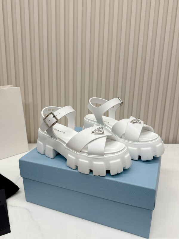 sy_no_C9ADD3A02F6444BB0F83DC03424EDD43_0 Prada White Triangle Logo Gear Platform Sandal
