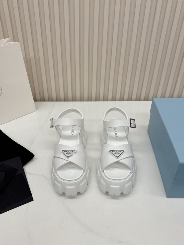 sy_no_C9ADD3A02F6444BB0F83DC03424EDD43_1 Prada White Triangle Logo Gear Platform Sandal