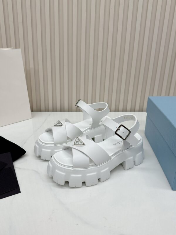 sy_no_C9ADD3A02F6444BB0F83DC03424EDD43_2 Prada White Triangle Logo Gear Platform Sandal