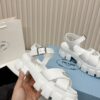 sy_no_C9ADD3A02F6444BB0F83DC03424EDD43_3 Prada White Triangle Logo Gear Platform Sandal