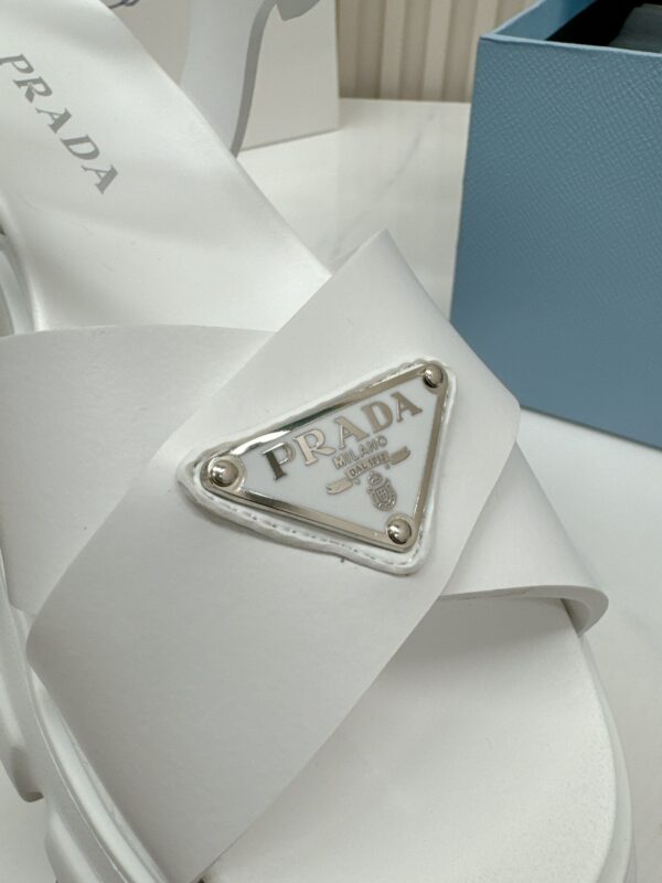 sy_no_C9ADD3A02F6444BB0F83DC03424EDD43_7 Prada White Triangle Logo Gear Platform Sandal