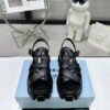 sy_no_CBE74BEF0A80EACA11D3EC219F2ED384_1 Prada Black Woven Roman Gear Platform Sandal