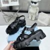 sy_no_CBE74BEF0A80EACA11D3EC219F2ED384_4 Prada Black Woven Roman Gear Platform Sandal