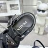 sy_no_CBE74BEF0A80EACA11D3EC219F2ED384_6 Prada Black Woven Roman Gear Platform Sandal